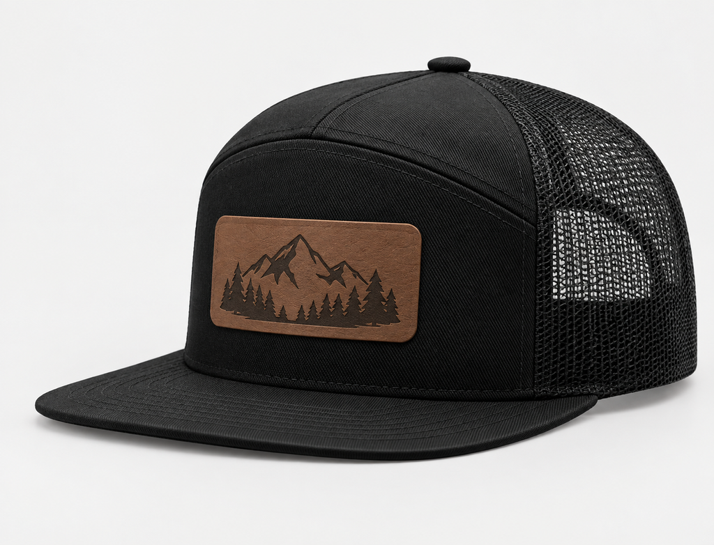 Black Richardson 168 Hi-Pro seven-panel trucker hat with mesh back and a custom brown leatherette patch