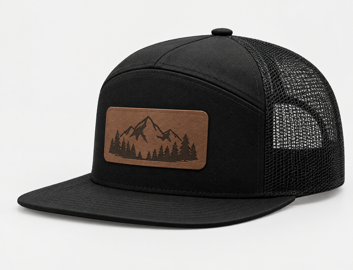 Black Richardson 168 Hi-Pro seven-panel trucker hat with mesh back and a custom brown leatherette patch